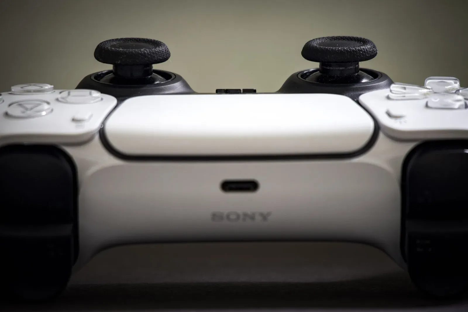 Detailed view of a Sony PlayStation 5 DualSense controller, highlighting design and features.